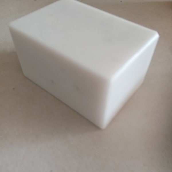 Base in white marble