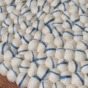 Felt Ball Rugs with Tie Dye Marble Base color White and Stripes Blue . 100 % Wool pebble Handmade Rug (Free Shipping)