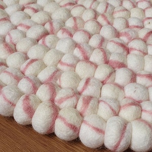 Felt Ball Rugs with Tie Dye Marble Base color White and Stripes Baby Pink . 100 % Wool pebble Handmade Rug (Free Shipping)