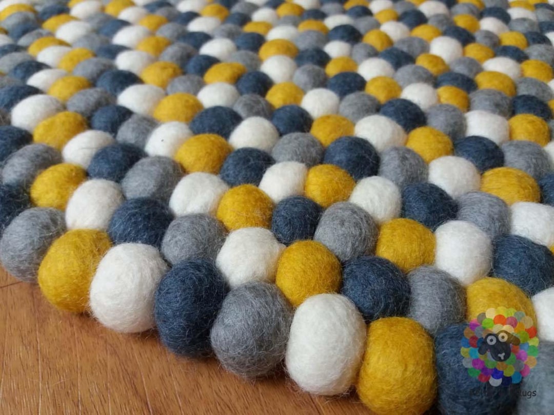 Felt Ball Rugs. Mustard Yellow / White / Light Grey and Dark Grey