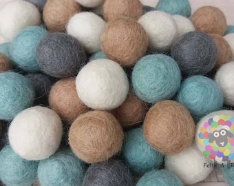 Vilten pompons van 2,2 cm. Wollen pompom decoratie babyslinger. 100% wol - knutselen