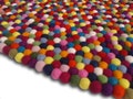 Multicolored Felt Ball Rug: Handmade Wool Nursery Decor product logo