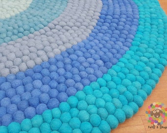 Alfombra circular de fieltro de lana hecha a mano: decoración para habitación infantil