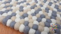 Handmade Felt Ball Rug – Natural Wool Nursery Decor product logo