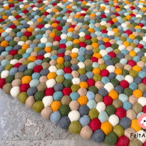 SALE Felt Ball Rugs 135 cm. Shades of Orange , Red, Blue, White and Grey . 100 % Wool pebble Handmade Rug (Free Shipping)