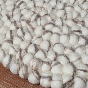 Felt Ball Rugs with Tie Dye Marble Base color White and Stripes Brown . 100 % Wool pebble Handmade Rug (Free Shipping)