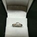 5mm Charles & Colvard Moissanite engagement ring set in sterling silver. Size L1/2 in stock.