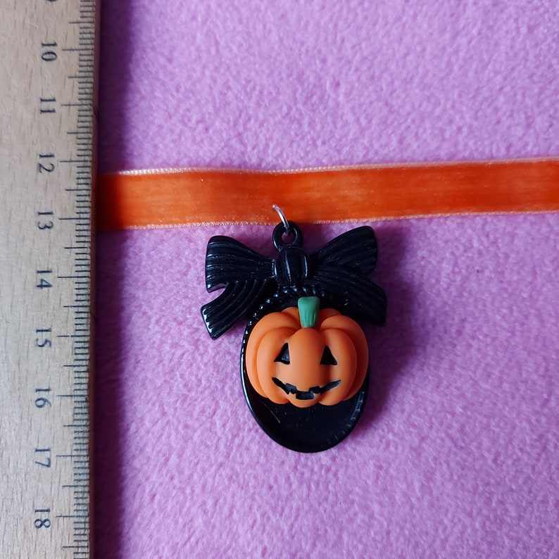 Pastel orange and black kawaii pumpkin cameo halloween charm Choker lollipop baby wings kawaiicute bow mint pink glitter bunny donut bow