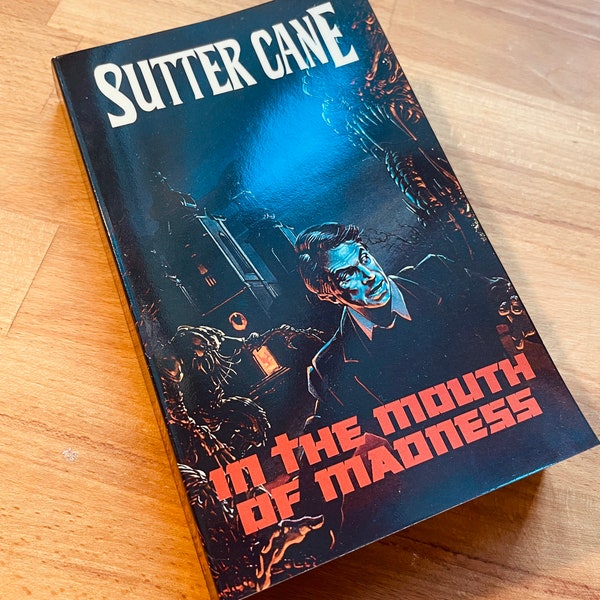 Sutter Cane « In the Mouth of Madness »+ Puzzle cover (In The Mouth of Madness)