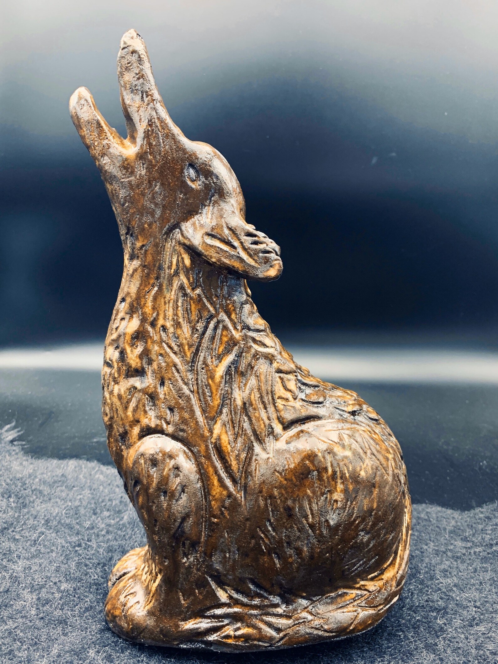 ceramic wolf statue