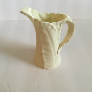 Antique English Royal Worcester White /Leaf Fern Ewer/Pitcher H 4” Dated 1894 has a crack that has been repaired sold as is.