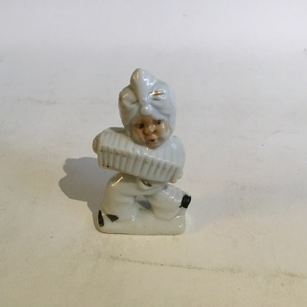 Vintage Small C 1950’s Porcelain Figurine with Turban Playing The Accordion .Stamped Japan.