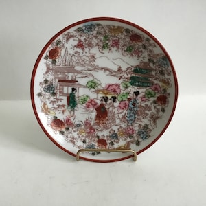Vintage Geisha Ware Saucer Made In Japan. Traditional Motif With Geishas In Garden Surrounded By Pagodas.