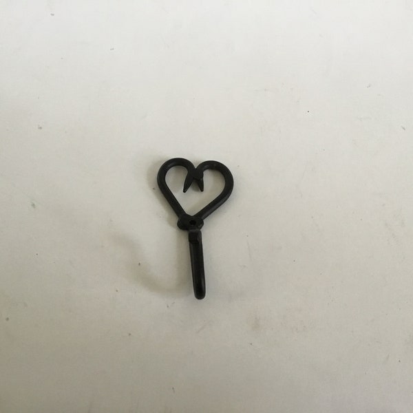 Small Black Metal Heart Shaped Wall Hook Approx 3 X 2 X 1”New Condition.