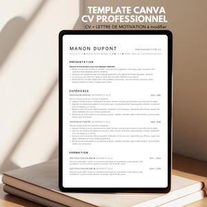 Op de afbeelding: Een zwarte tablet toont een professionele cv-sjabloon met de naam "Manon Dupont". Het cv bevat secties voor presentatie, ervaring en opleiding. De tekst "CV + LETTRE DE MOTIVATION à modifier" staat bovenaan.
