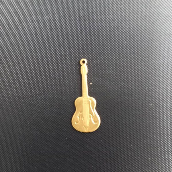 Small gold coloured guitar charm. Acoustic guitar charm.