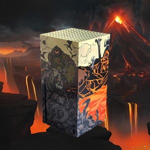 May include: A cube-shaped gaming console featuring artwork from the video game Doom. The design includes a warrior figure, demons, and a volcanic landscape in shades of black, gray, orange, and green. The top of the console has a reflective, grid-like pattern.