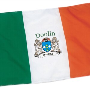 May include: Irish flag with green, white, and orange vertical stripes. The white stripe features the word "Doolin" above a coat of arms with the word "Ireland" below.