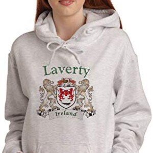 May include: Light gray hooded sweatshirt with the name "Laverty" in green script above a family crest. The crest features a red shield with a white border, flanked by two golden lions. The word "Ireland" is printed below the crest.