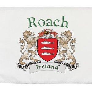 May include: White flag with the name "Roach" in green script above a coat of arms. The coat of arms features a red shield with three silver fish, flanked by two tan lions. The word "Ireland" is written on a banner below.