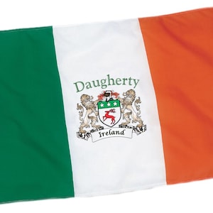 May include: Irish flag with green, white, and orange vertical stripes. The white stripe features the name "Daugherty" above a coat of arms with a deer and the word "Ireland".