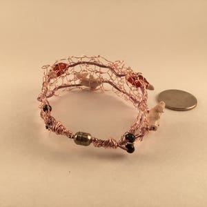 Pink wire bracelet with fish image 5