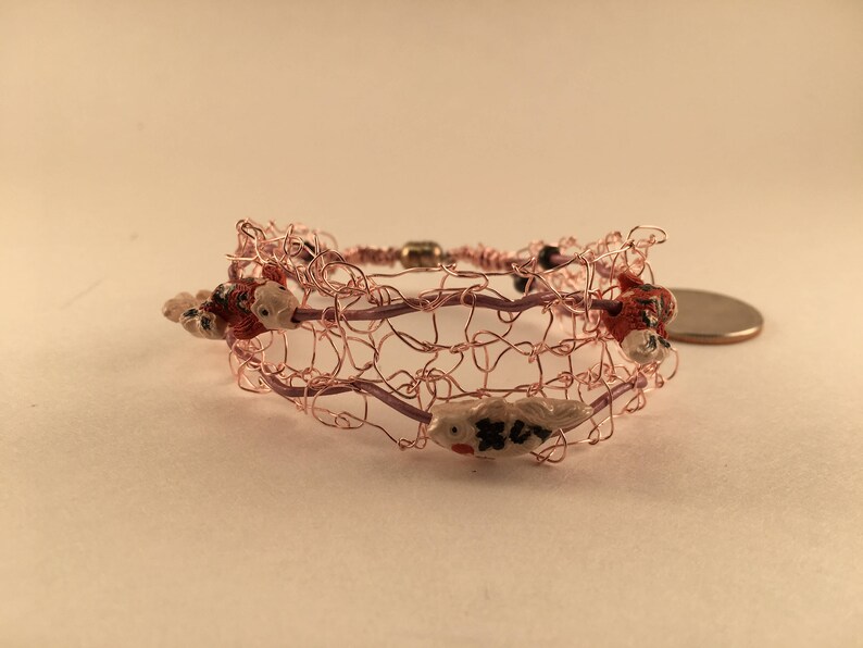 Pink wire bracelet with fish image 4