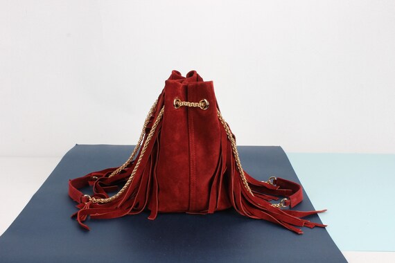 red suede shoulder bag
