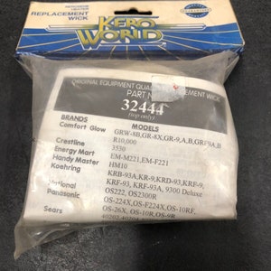 May include: A white and black package with a blue border. The package contains a replacement wick for a kerosene heater. The package lists the part number 32444 and lists various brands and models that the wick is compatible with.