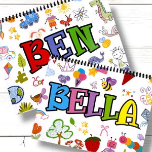 May include: Two spiral-bound notebooks with colorful illustrations and names. One notebook says "BEN" in red, blue, and green letters, surrounded by drawings of a train, sun, and dinosaur. The other says "BELLA" in blue, pink, green, and yellow, with drawings of a bee, ice cream, and strawberry.