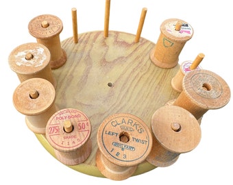 A Set of Nine, Mid Century Vintage 1950’s/60’s Wooden Thread Spools on a Wooden Lazy Susan made for Spools