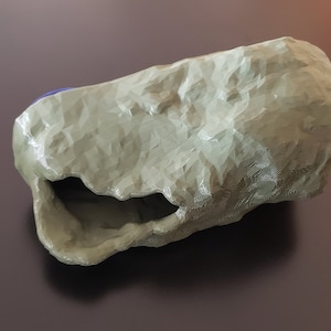 Esconderijo de lagartixa estilo rock natural realista - ventosa