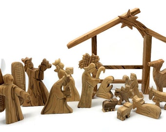 May include: A wooden nativity scene set with 14 hand-carved figures, including the baby Jesus, Mary, Joseph, three wise men, an angel, a shepherd, a donkey, a camel, and two sheep. The figures are made of olive wood and have a natural finish. The set also includes a wooden stable.