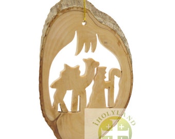 Hand Carved Christmas Tree Ornament. The Shepperd and camel carved in it. The Birth Story