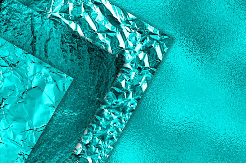 May include: A turquoise background with three pieces of crumpled aluminum foil arranged in a triangular shape.