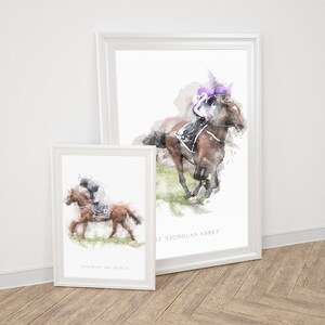 May include: Two framed watercolor paintings of horses and riders. The top painting features a brown horse with a rider wearing a purple helmet and the text "St Nicholas Abbey". The bottom painting features a brown horse with a rider wearing a black helmet and the text "Ruler of the World".