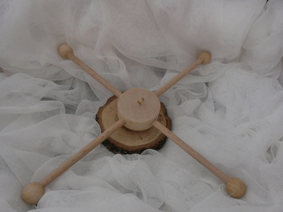 round wooden cot