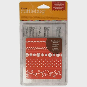 Könnte beinhalten: Cricut Cuttlebug Prägebordüren-Set. Das Paket enthält fünf verschiedene Bordürendesigns in Weiß auf rotem Hintergrund. Der Text "Just My Type" ist ebenfalls enthalten.