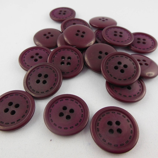 bouton en plastique coloris rouge bordeaux