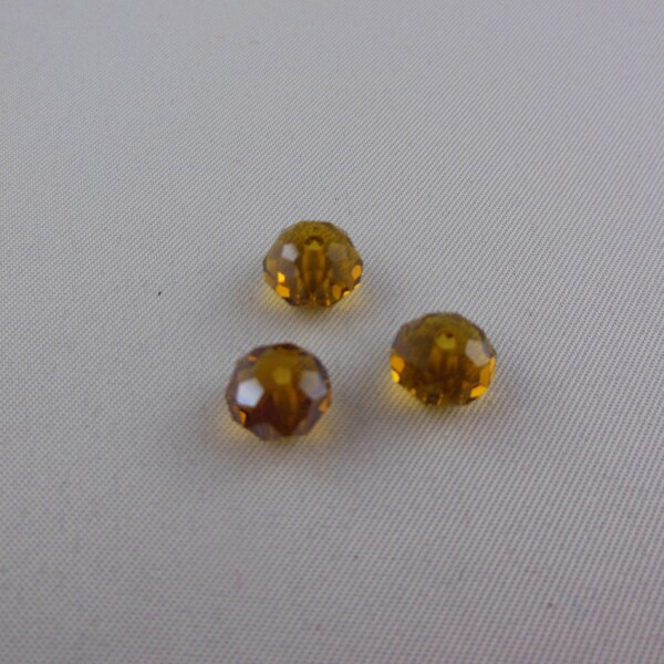 Perles Swarovski ronde aplatie coloris topaze