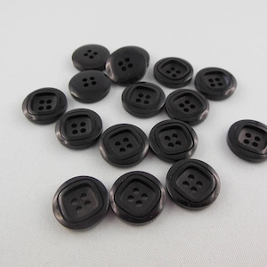 black colored plastic button