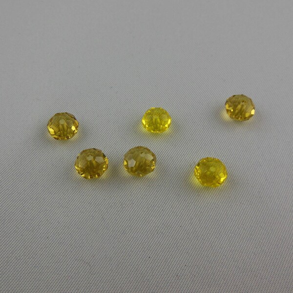 Perles Swarovski ronde aplatie coloris mélange de jaune