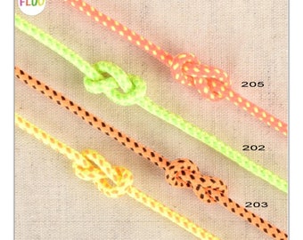 May include: Four different colored cords with knots tied in them. The cords are orange with white dots, green with white dots, yellow with orange dots, and black with orange dots. The cords are labeled with numbers 201, 202, 203, and 205.