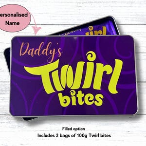 May include: A purple and yellow tin with the text "Daddy's Twirl Bites" on it. The tin is filled with two bags of 100g Twirl bites.