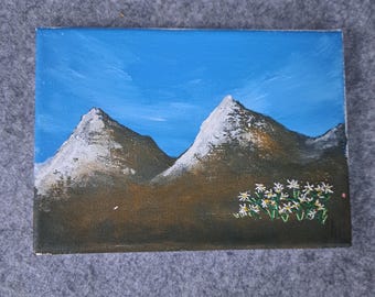 Snow capped painting art with mountains and embroidered eidelwiess