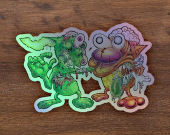 Pegatina holográfica de Zombie Ren y Stimpy