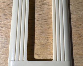 Sierra Sierraplex ribbed Bakelite ivory receptacle wall plate. Compatibility, please measure the opening of your receptacle.