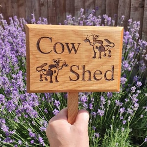 Personalised Oak garden signs with a 25cm ground stake attached