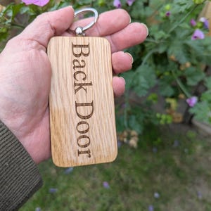 Groot massief eiken sleutelhanger met kogelringbevestiging