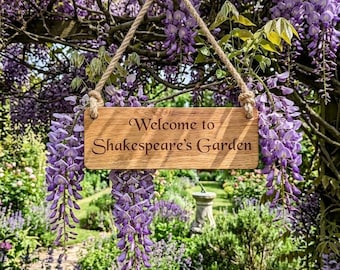 Personalised engraved solid Oak outdoor hanging sign with natural jute rope.